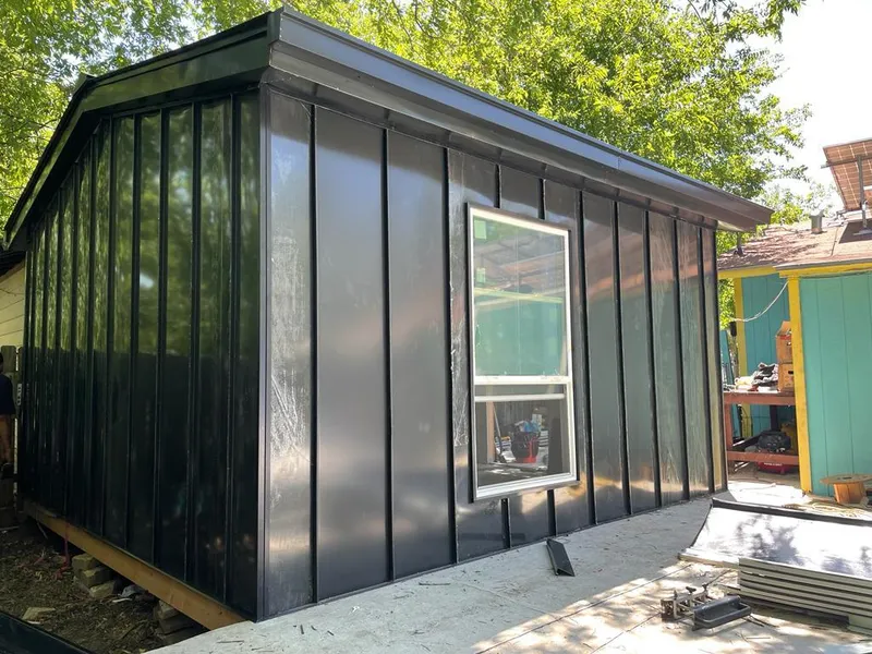 Black standing seam metal wall panels for Metal Roof Installation in Tillamook